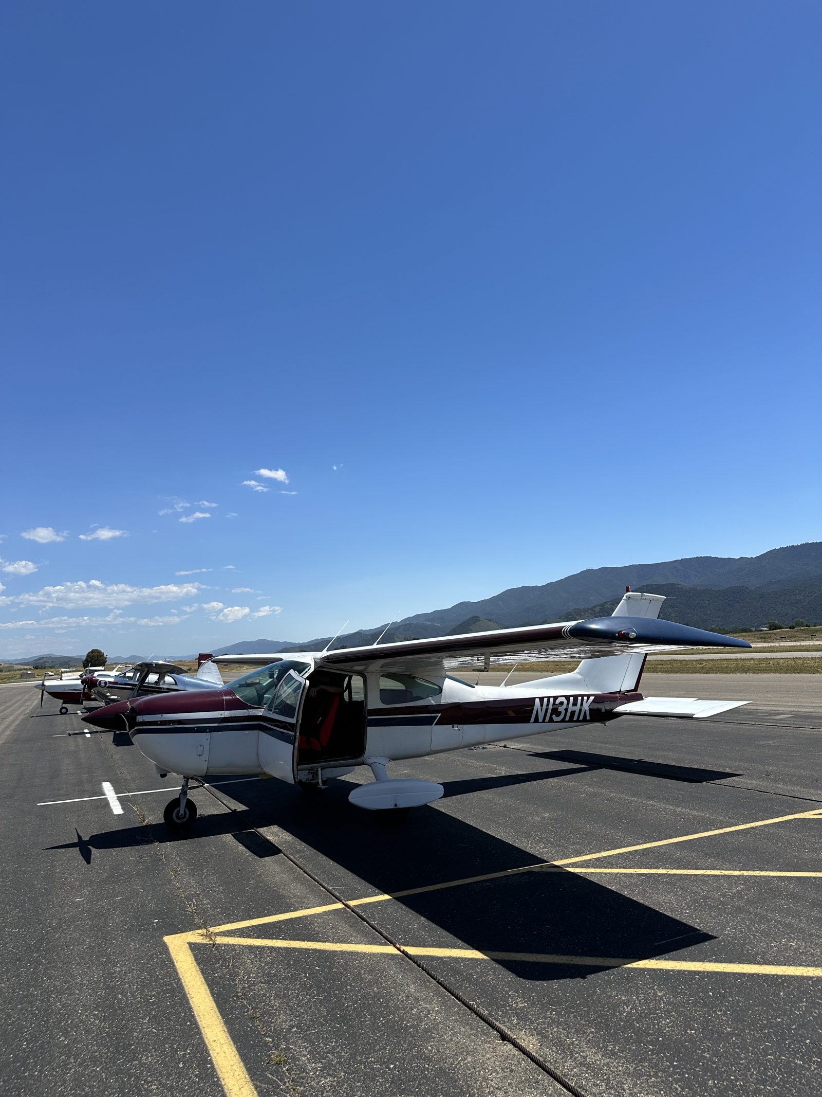 N13HK at a mountain airport